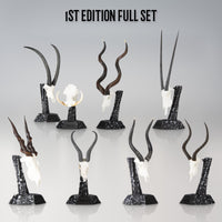 Skullies 1st Edition Full Set: all eight Skullies on their Display Pedestals