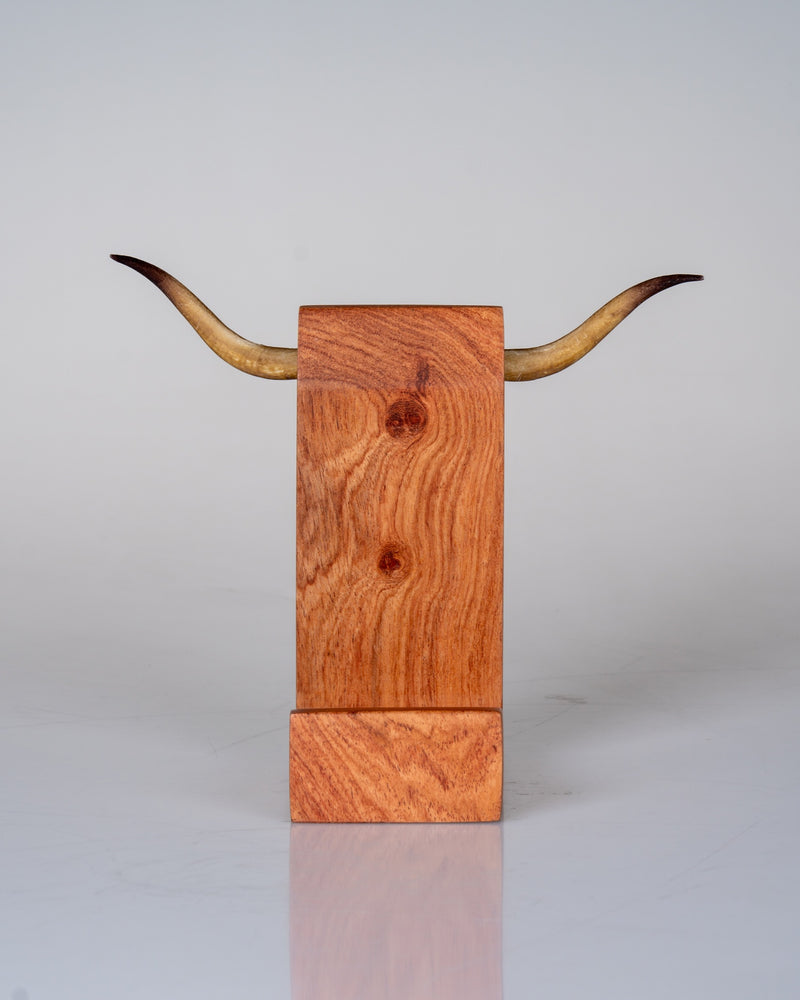 Load image into Gallery viewer, Cellphone Mount rosewood display pedestal from behind, longhorn horns spanning the wooden column
